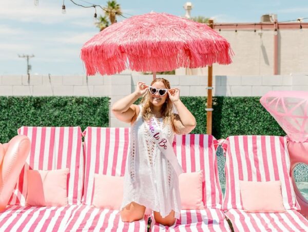 Bride-to-be enjoying a tropical poolside scene.