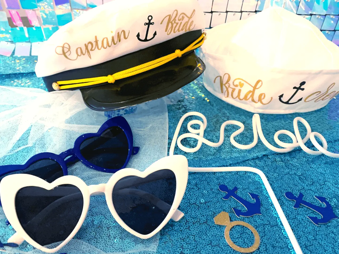 White and blue heart sunglasses with captain hat